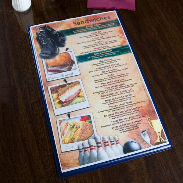 A royal blue Hamilton menu board on a table.