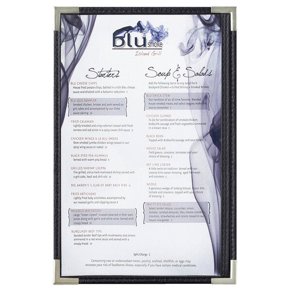 A black menu board with silver corners and two clear panels displaying a white menu with text and images.