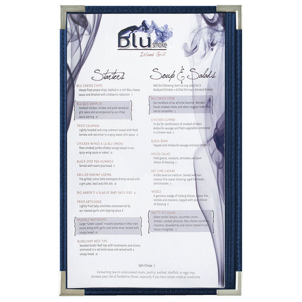 A blue Royal menu board with silver corners on a table with a menu inside.