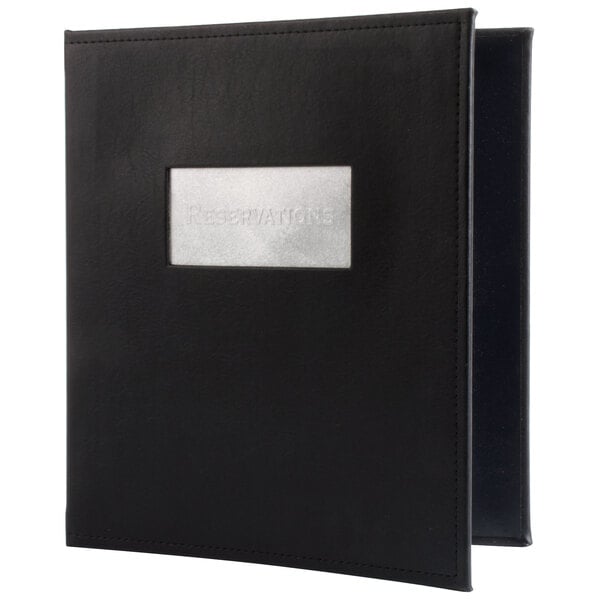A black rectangular Menu Solutions reservation binder with a silver rectangular label.