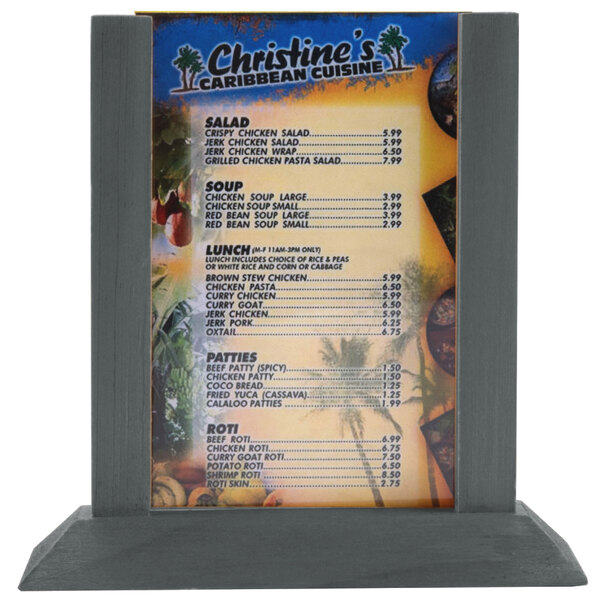 A Menu Solutions ash wood table tent holding a menu on a table in a restaurant.