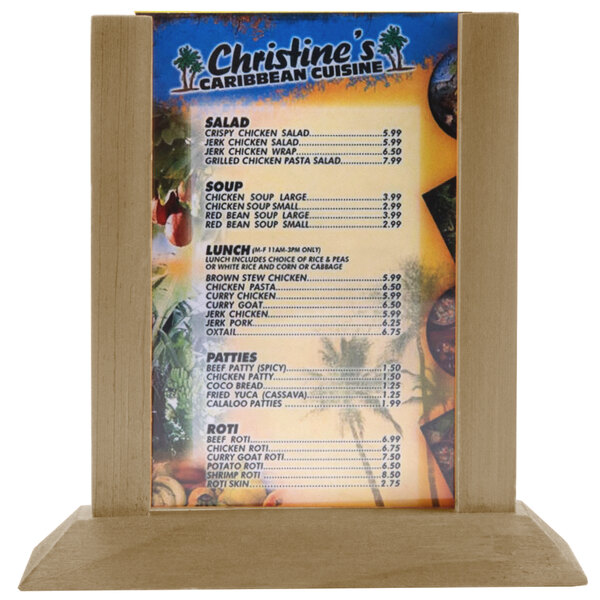 A Menu Solutions antiqued wood table tent holding a menu on a wooden stand.