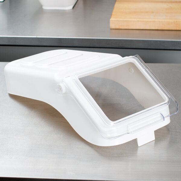 A white plastic container with a clear window.