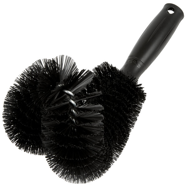 A black Unger curved pipe brush with black bristles and a hole in the handle.