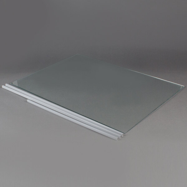 The front glass panel for a Paragon TP-16 Popcorn Popper with a white background.