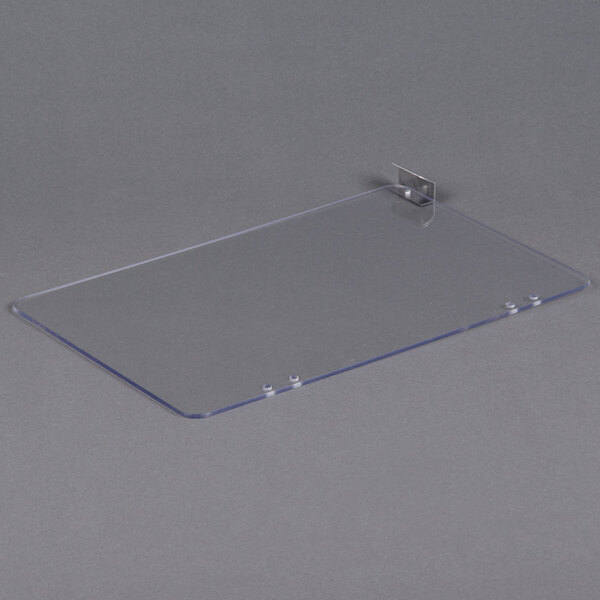 A clear plastic plate with metal brackets.