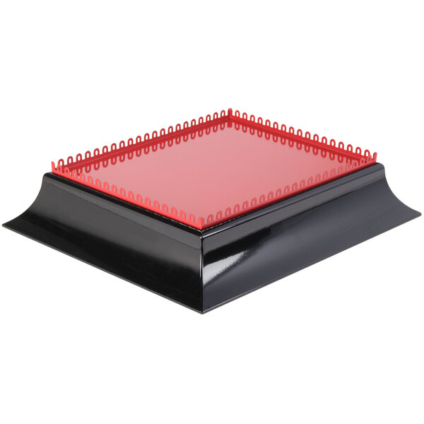 A black and red square tray with a red edge and handle.