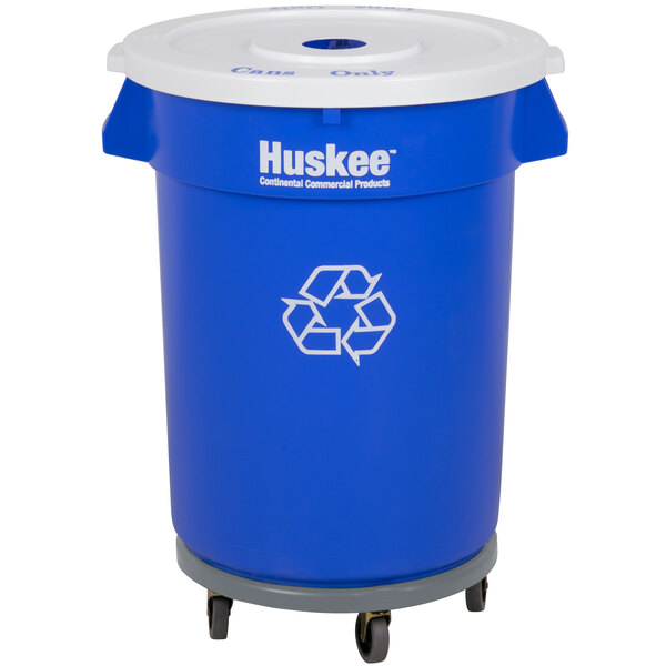 A blue trash can with wheels.