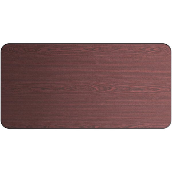 A Lancaster Table & Seating rectangular wood table top with a reversible cherry and black finish.