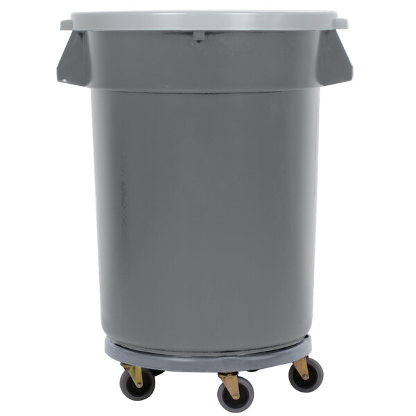 A grey plastic Continental Huskee trash can on wheels.