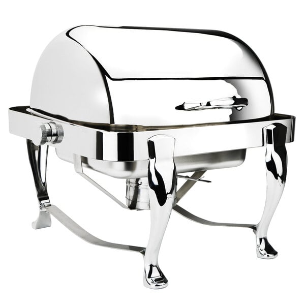 A silver stainless steel square roll top chafer on a table with legs.