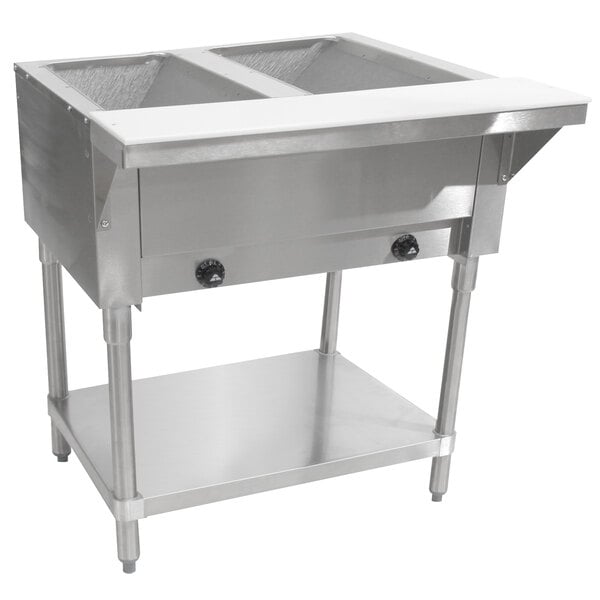 A stainless steel Advance Tabco natural gas powered hot food table with two open wells.