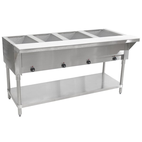 A large stainless steel Advance Tabco electric hot food table with undershelf.