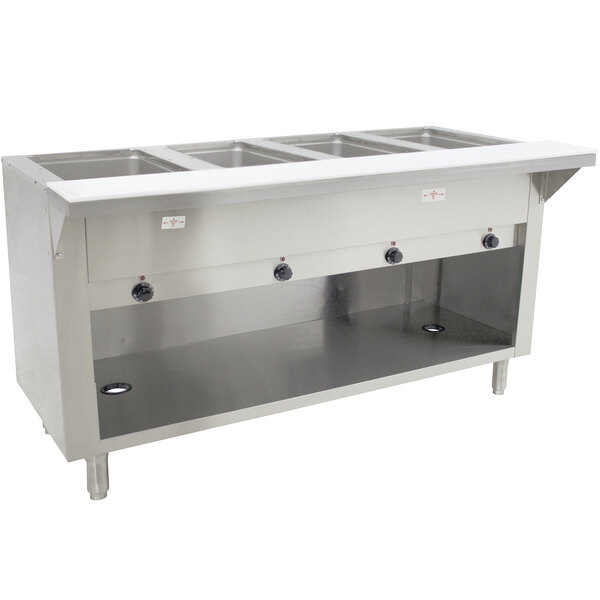 An Advance Tabco stainless steel electric hot food table with an enclosed base and four open wells.