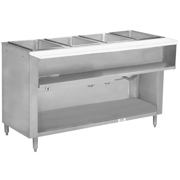 An Advance Tabco stainless steel liquid propane hot food table with enclosed undershelf and four open wells on a counter.