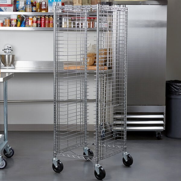 A Metro RE1 unassembled wire cart with metal shelves on wheels.
