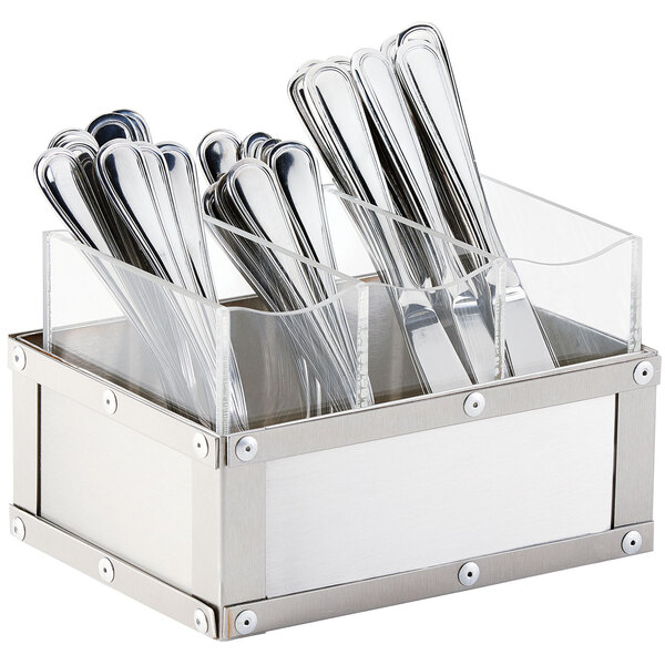 A close-up of a Cal-Mil stainless steel flatware organizer with silverware inside.