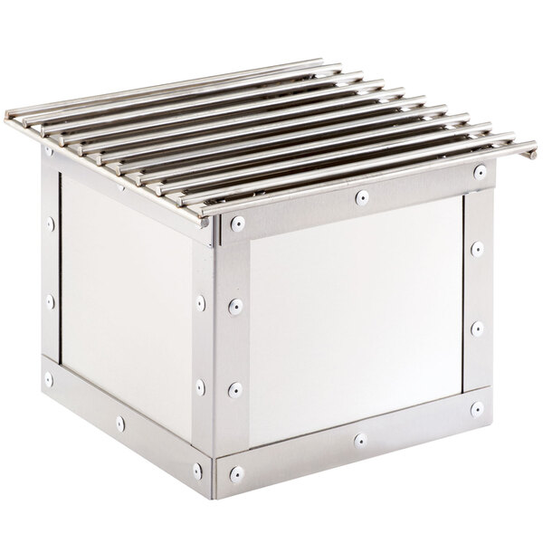 A Cal-Mil stainless steel box with a metal grate inside.