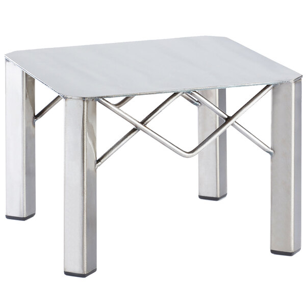 A Cal-Mil Industrial square riser with metal legs on a table.