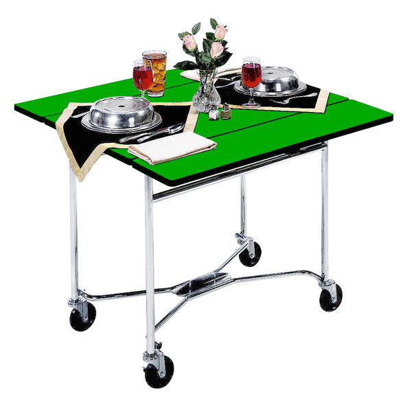 A Lakeside green room service table with food and drinks on it.