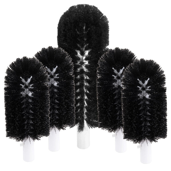 A set of four black brushes with white bristles.