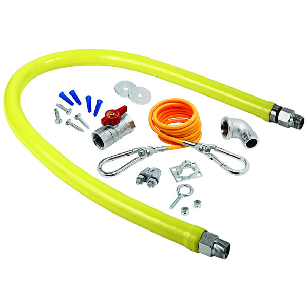 A yellow T&S Safe-T-Link gas hose with installation accessories.