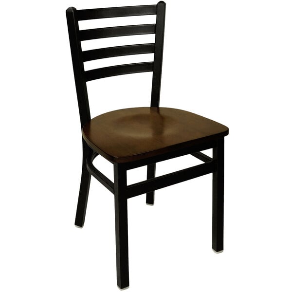 A BFM Seating black metal ladder back chair with a wooden seat.