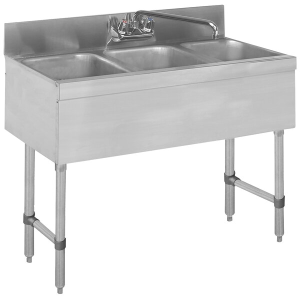 An Advance Tabco stainless steel underbar sink with three compartments.