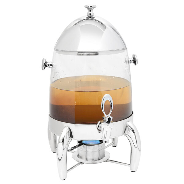 An Eastern Tabletop stainless steel hot beverage dispenser with a glass container full of a hot beverage.