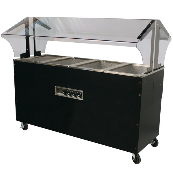 A black Advance Tabco hot food table with a clear cover over the food pans.