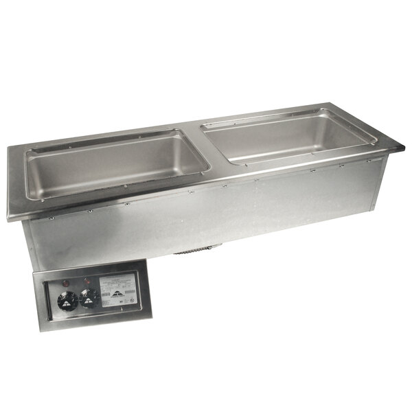 A stainless steel Advance Tabco drop-in hot food well with two pans.