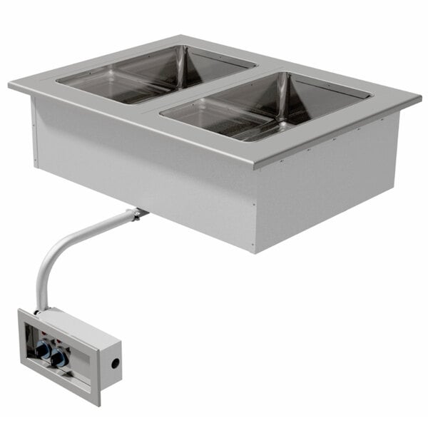 An Advance Tabco stainless steel drop-in hot food well with two wells on a counter.