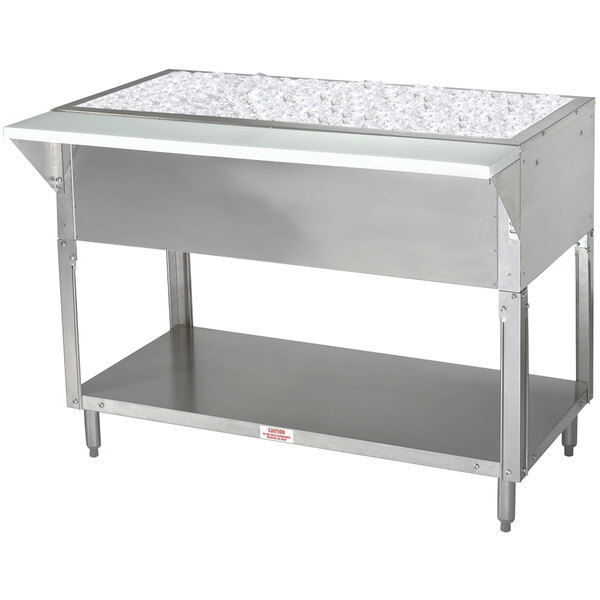 An Advance Tabco stainless steel table with an ice-cooled surface.