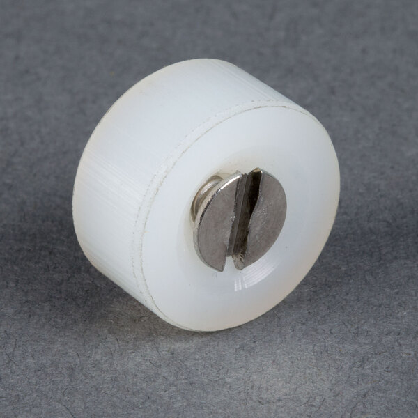 A white plastic wheel with a metal screw and a nylon gasket.