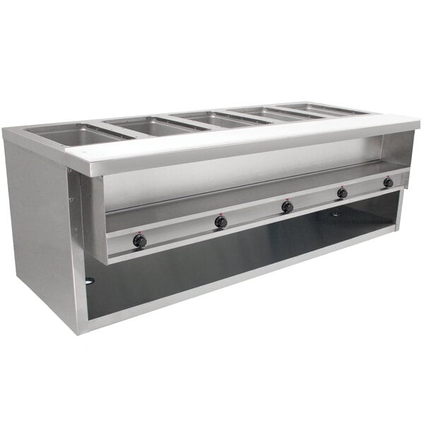 An Advance Tabco stainless steel electric sealed table with enclosed base holding five pans of hot food.