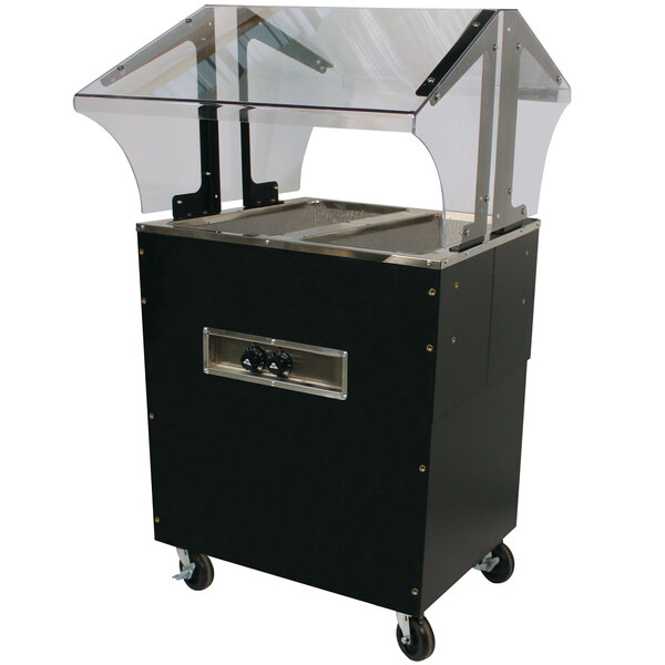 An Advance Tabco stainless steel enclosed base electric hot food table on a black and silver cart with a clear cover.
