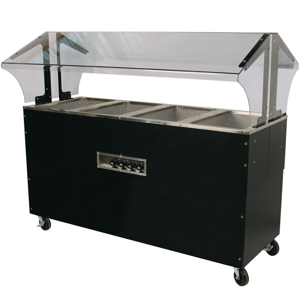An Advance Tabco black stainless steel enclosed base hot food table with clear covers over food pans.