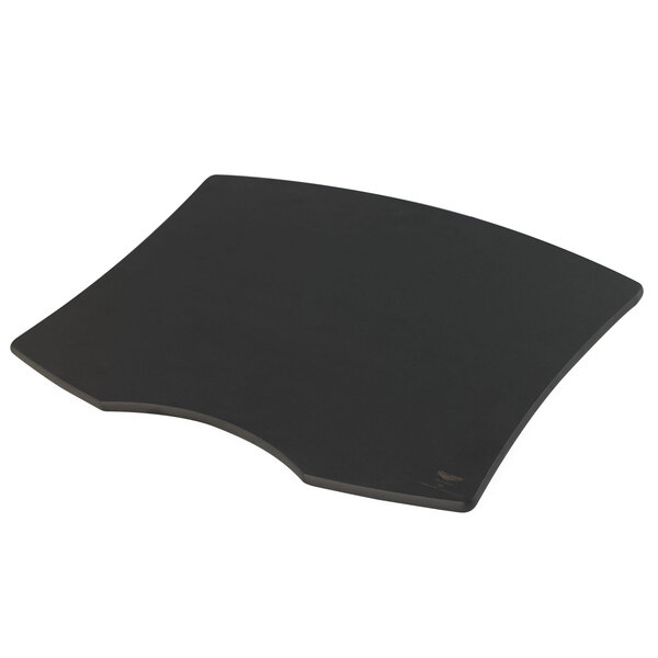 A black contoured cutting board for a Vollrath carving station.