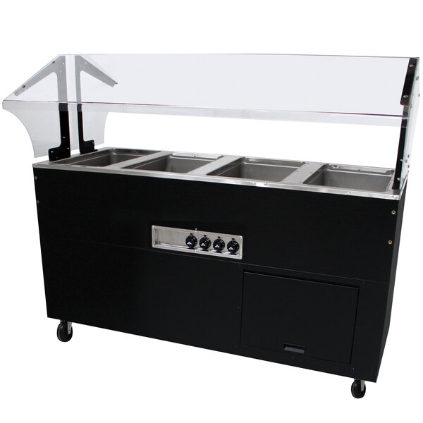 An Advance Tabco stainless steel hot food table with a black base and clear top.