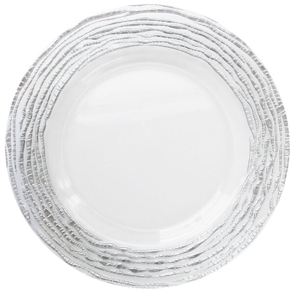 A white Charge It by Jay glass charger plate with silver lines.
