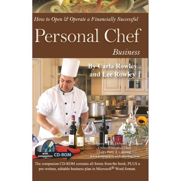 The cover of the book "How to Open & Operate a Financially Successful Personal Chef Business" on a table in a professional kitchen.