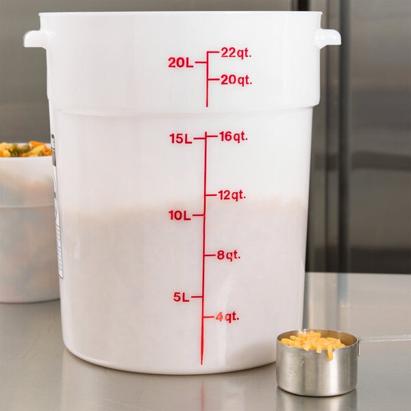 A large white Cambro food storage container with red lettering.