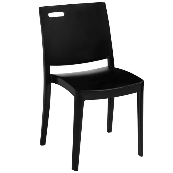 A pack of 4 black Grosfillex Metro stacking chairs.