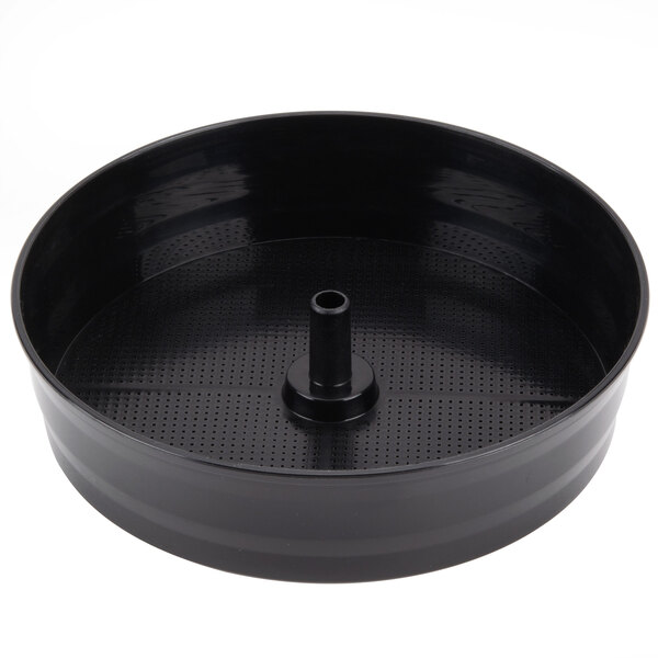 A black plastic round brew basket with a hole in it.