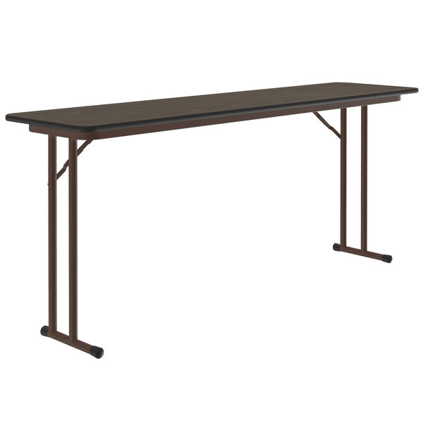 A Correll rectangular seminar table with a black top and black legs.