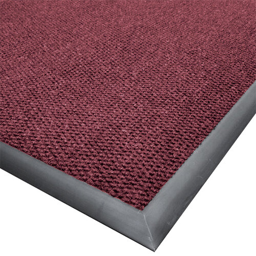 A burgundy carpet mat with a gray border.