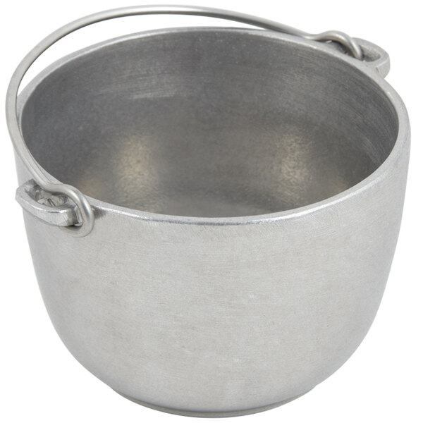 A silver Bon Chef pewter tureen with a handle.