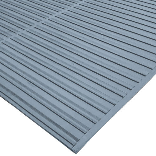 A close-up of a gray rubber Ni-Rib floor mat.