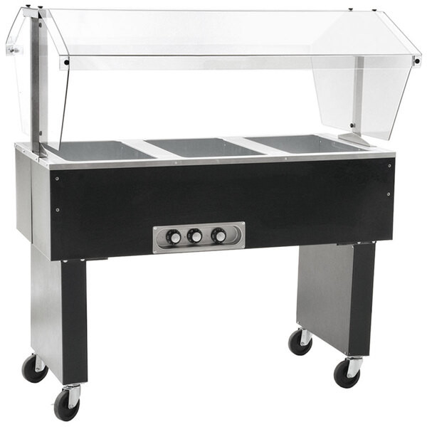 An Eagle Group Deluxe hot food buffet table with a clear top over black food pans on a black and silver base.