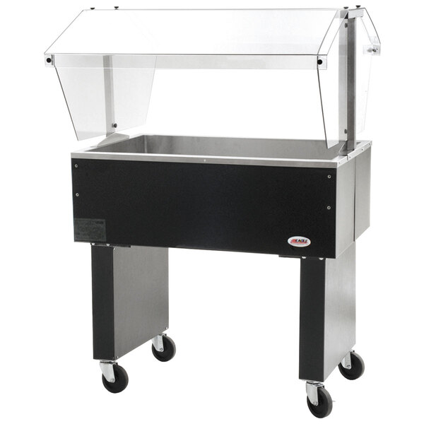 An Eagle Group portable ice-cooled buffet table with open base on a counter outdoors.